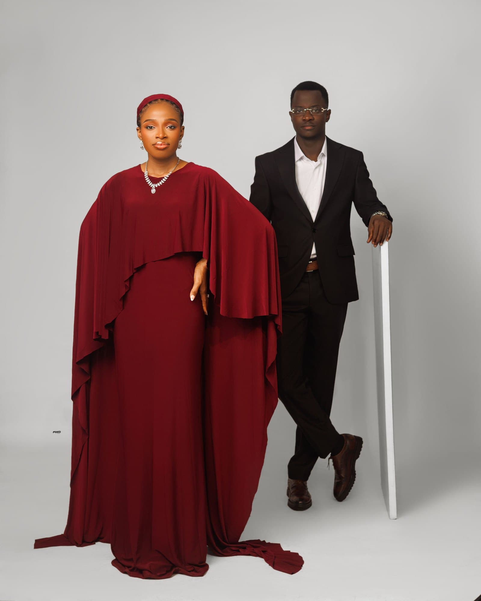 Full-length editorial portrait of Scholarstica and Joseph